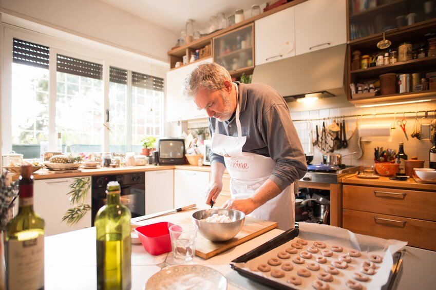Man cooking food in Genoa