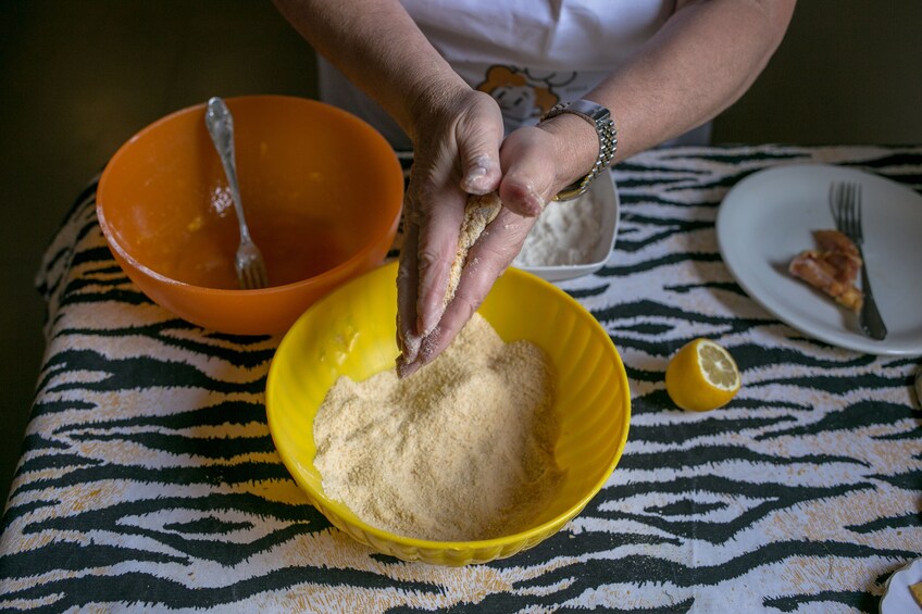 Private Market tour + Cook + Dine in a local home in Perugia