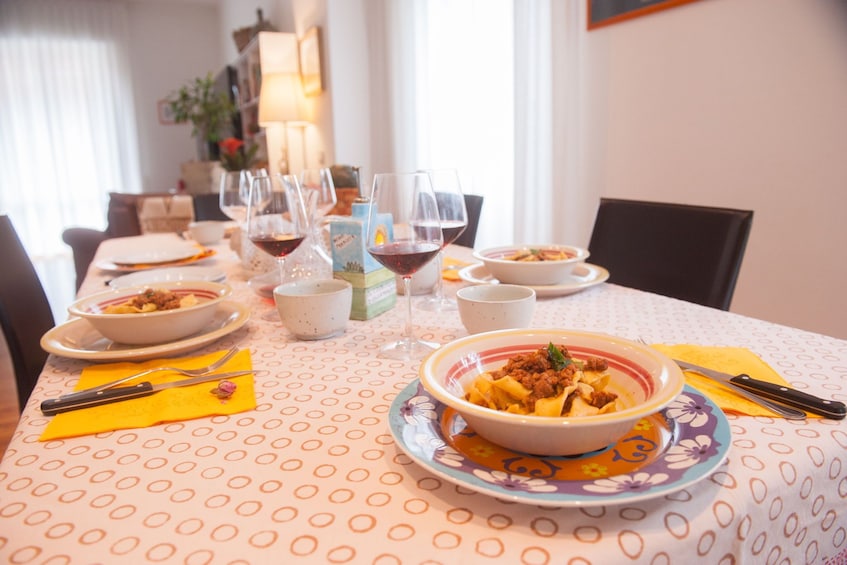 Local Market visit and Dining at a local's home in Verona