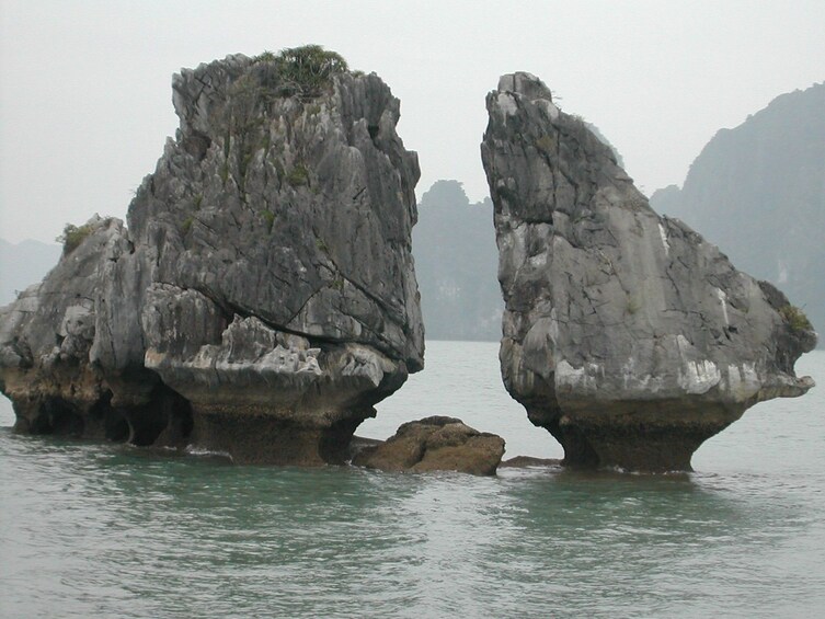 Rock formations in the water in Halong Bay