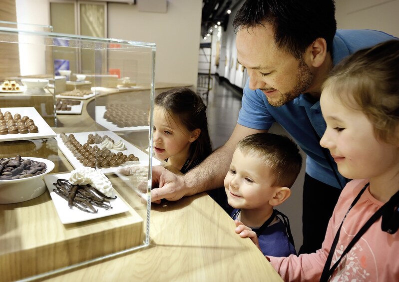 Family at Maison Cailler Chocolate Factory in Switzerland
