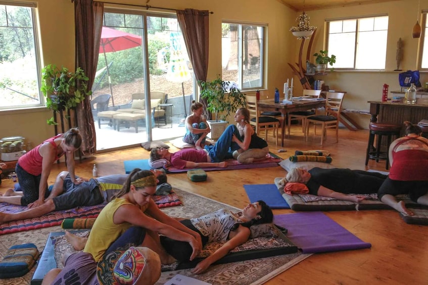 Various people work on their partners who are laying down