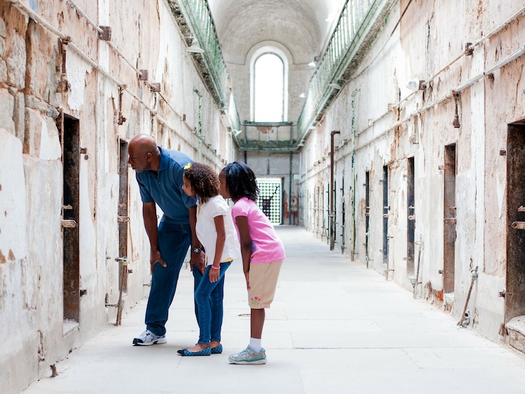 Family touring the Eastern State Penitentiary in Philadelphia
