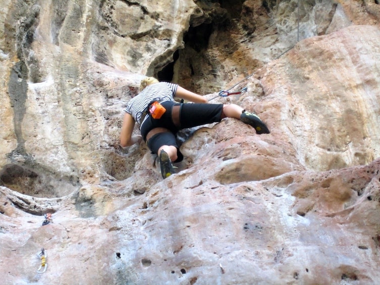 Woman on a Rock Climbing Course at Railay Beach
