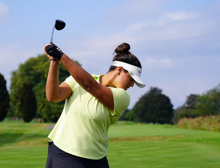 Woman golfing at Vietnam Golf & Country Club