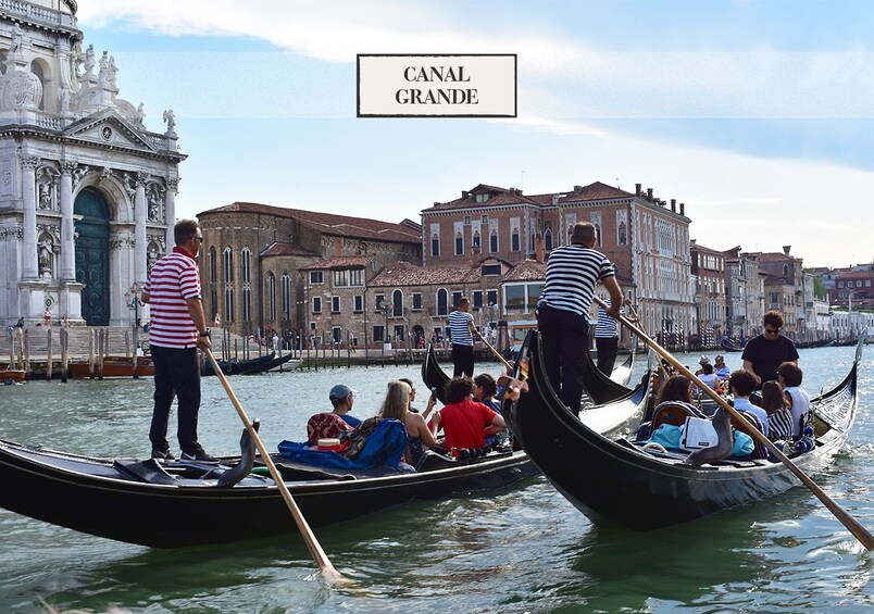 Two gondolas on a Venetian canal tour