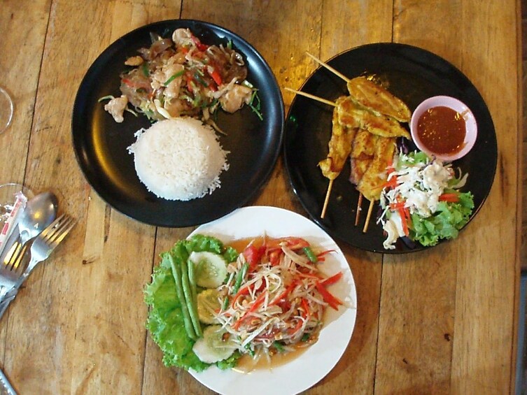 Aerial view of three Thai dishes
