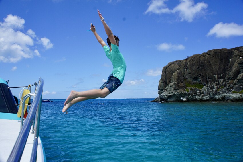 Power Catamaran Circumnavigation & Snorkeling adventure