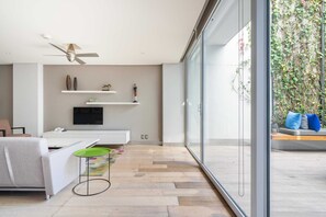 Sophisticated Living Area with Patio Views


