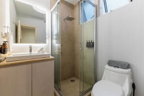Premium bathroom featuring a deluxe shower experience.