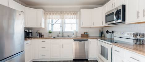 Open Kitchen with all the supplies needed for a home cooked meal!