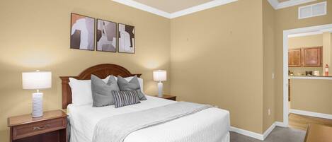 Two master bedrooms, both with nightstands on both sides of the bed and TV!