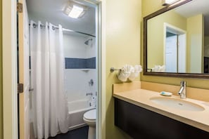 Full bathroom with a shower/tub. Basic toiletries and towels are provided
