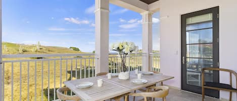 Enjoy the great outdoors from the comfort of our inviting outdoor dining table.