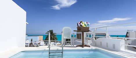 Roof terrace with pool and ocean view