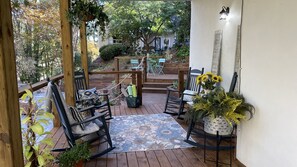 Terrace level Porch, steps down to backyard, path to lake, hot tub & fire circle