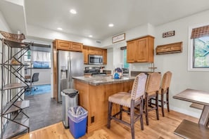 The chef in your group will enjoy cooking in the fully equipped kitchen while the open layout will keep them connected to the group while they prepare a favorite meal.