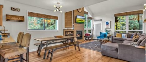 This 4-bedroom townhome is outfitted with chic decor and an open layout surrounded by tree views offering a serene retreat for your stay in Park City.