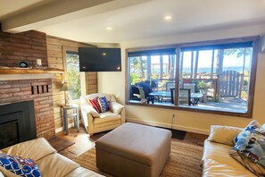 Relax in the living room while watching the bay or your favorite show.