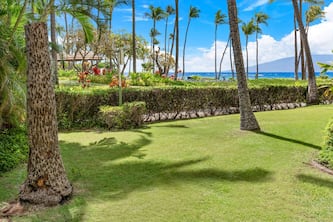 Maui Resort Rentals: Kaanapali Ali'i 312 - Luxurious 2BR Ground Floor w/ Partial Ocean Views & Large Lawn Area, Steps to Pools, Beach, BBQs!