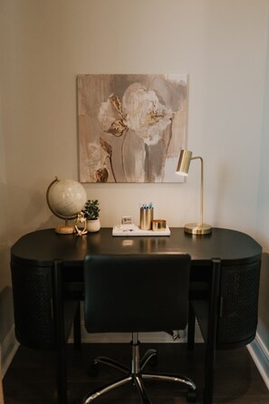 Seamlessly integrated private office with a laptop-ready setup and high-speed wireless internet for all devices, ensuring productivity and convenience.