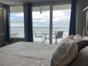 Looking out at the ocean from our comfy king bed