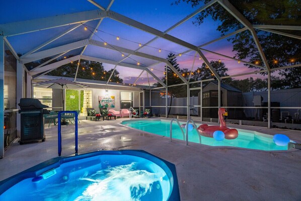 Relax and enjoy the sunset in the heated pool and hot tub!