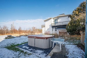 Private hot tub located in the backyard