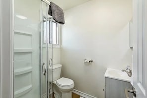 Looking into bathroom w/ Stand-up shower