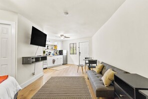 Open-concept living area with smart TV