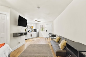 Open-concept living area with smart TV