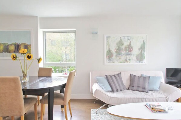Open plan lounge, dining and kitchen area. 