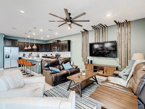 Step into a cozy and spacious living room, perfect for relaxing, streaming your favorite shows, or spending quality time with loved ones.