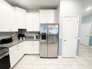 Refrigerator,Indoors,Kitchen,Floor,Flooring