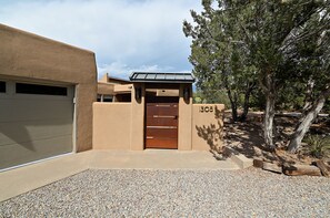 Entrance to home and front courtyard