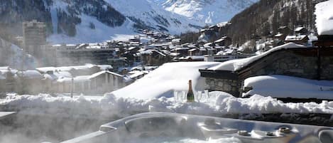 Relax and rejuvenate in our terrace hot tub, while soaking in the breathtaking mountain panoramas.