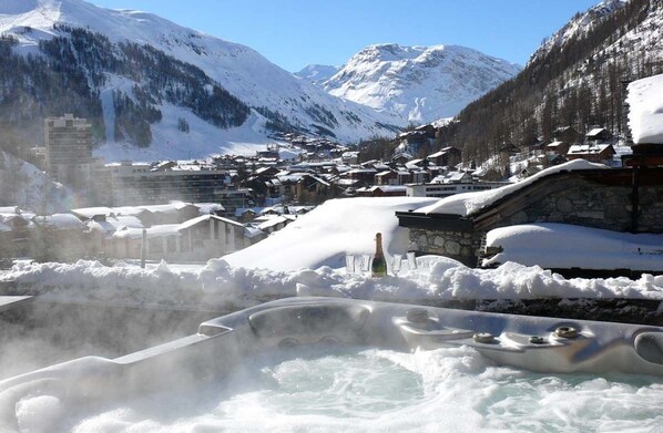 Relax and rejuvenate in our terrace hot tub, while soaking in the breathtaking mountain panoramas.