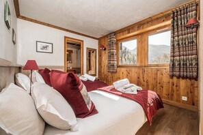 Retire to our plush double bedroom, a haven of tranquility designed for deep, restorative slumbers