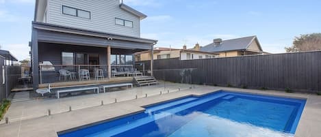 Families will love making a splash in the large outdoor swimming pool beneath the sun.