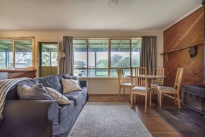  In the cooler months, cosy up next to the fireplace and put on your favourite movie.
