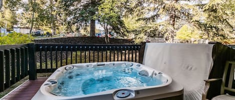 Private hot tub in the trees!