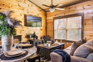 Welcome to MistyOak Cabin! Relax in the cozy living room after a long day exploring the Smoky.