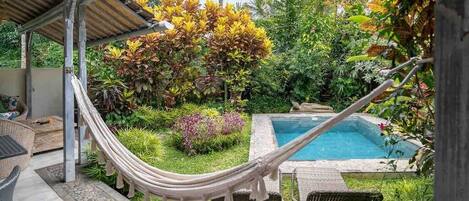 Enjoy the hammock by the private pool