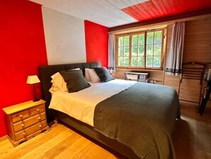 "Bright and Cozy Bedroom with Wooden Accents