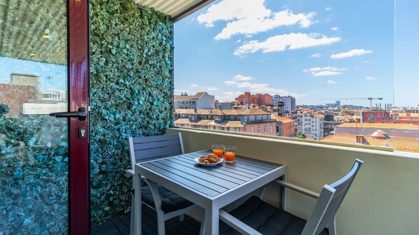 Spacious balcony where you can enjoy a delicous breakfast or a lovely glass of wine #balcony #airbnb