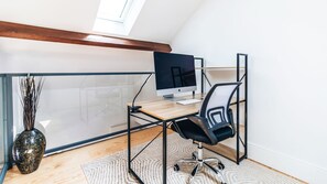 Boost your productivity in our cozy home office space. #HomeOffice #ProductivityBoost