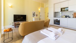 Unwind and make yourself at home in our inviting living room. Sink into the plush sofa and let the ambiance set the tone for a perfect retreat. Your cozy home away from home awaits!  #RelaxationStation