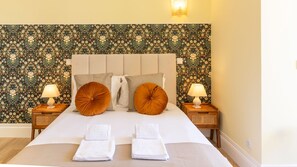 Rest and rejuvenation are on the agenda in this charming bedroom. From the sumptuous bedding to the carefully curated decor, every element invites you to unwind and have a peaceful night's sleep. #bedroom #airbnb