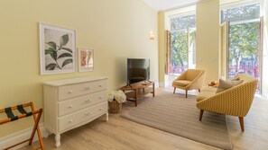 Unwind and make yourself at home in our inviting living room. Sink into the plush sofa and let the ambiance set the tone for a perfect retreat. Your cozy home away from home awaits!  #RelaxationStation