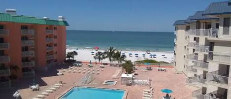 The spectacular Gulf Front and Living Room balcony view of the Pool Deck & Beach